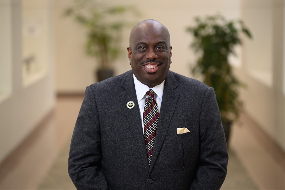 A smiling headshot of Council Member Malcolm Graham