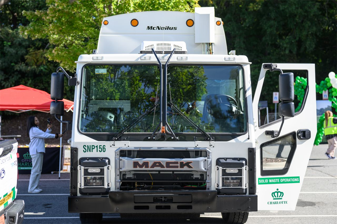 A Mack truck in a city parking lot
