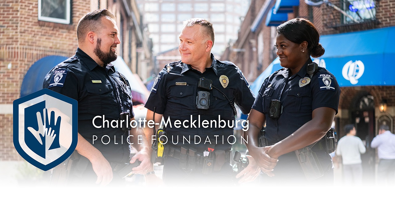 CMPF hero image of 3 police officers standing in the French Quarter of Charlotte