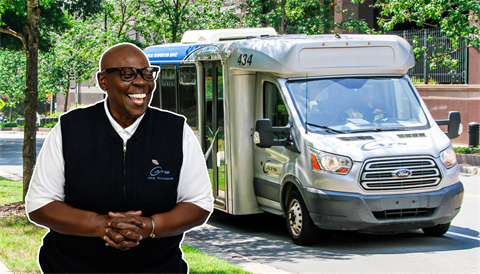 Ms Willaett Grier in front of a Paratransit bus
