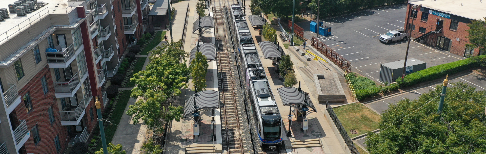 Aerial view of the CATS blue line riding along the rail tracks