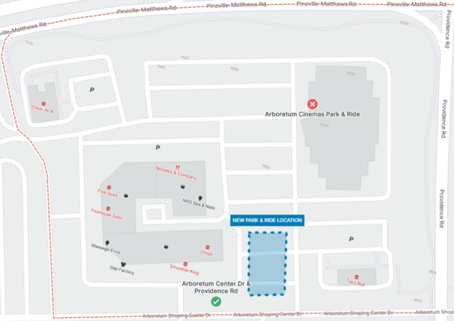 Overview of parking area and shopping locations off providence road. Showing a highlighted blue section label as new park and ride location.