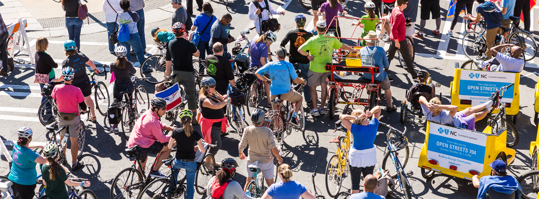 Group of cyclists gathered for Open Streets event