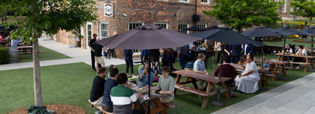 People eating outdoors at Fonta Flora event