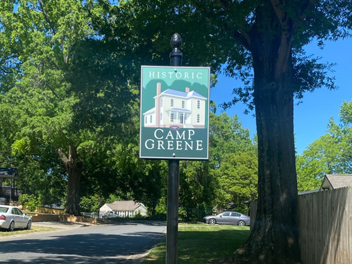image of a sign that reads Historic Camp Greene