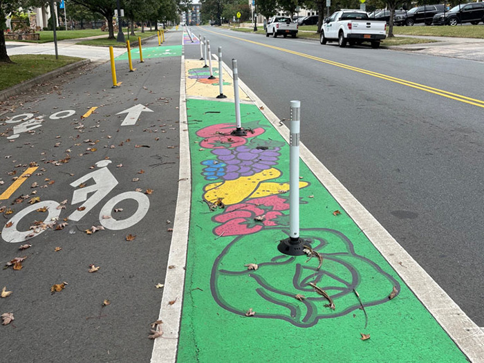 image of a street mural featuring paintings of fresh produce