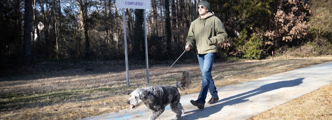 Harrisburg Road neighbor enjoying new sidewalk