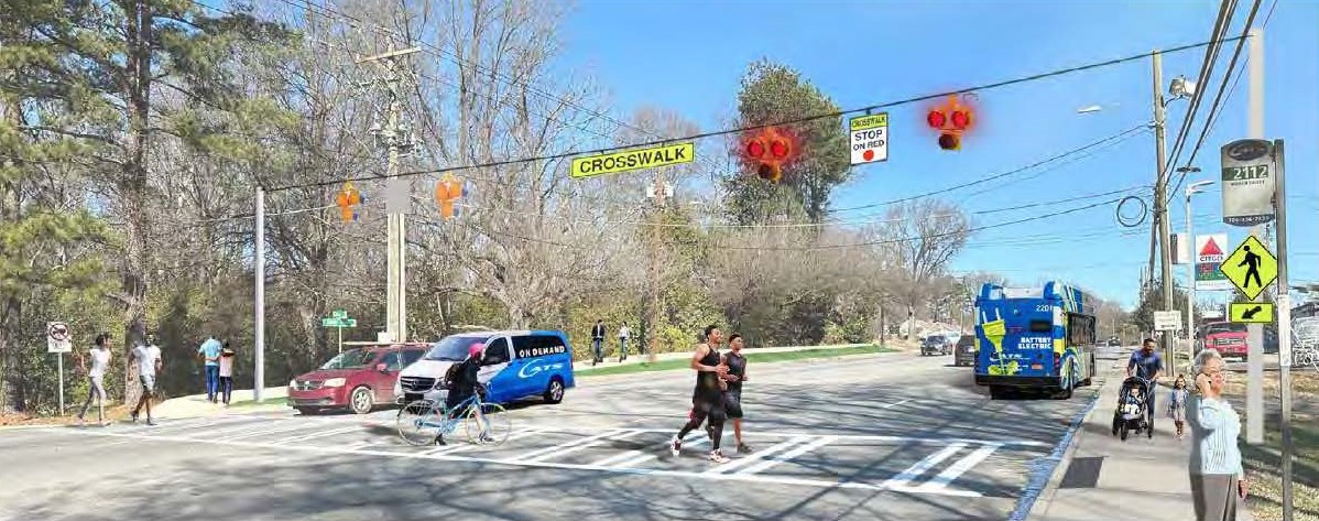 two pedestrians crossing a busy street on a crosswalk in an urban area