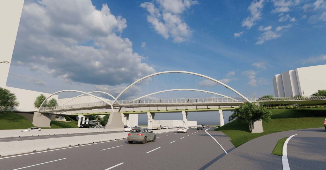 consultant rendering of Rail Trail bridge spanning I-277 during the day.