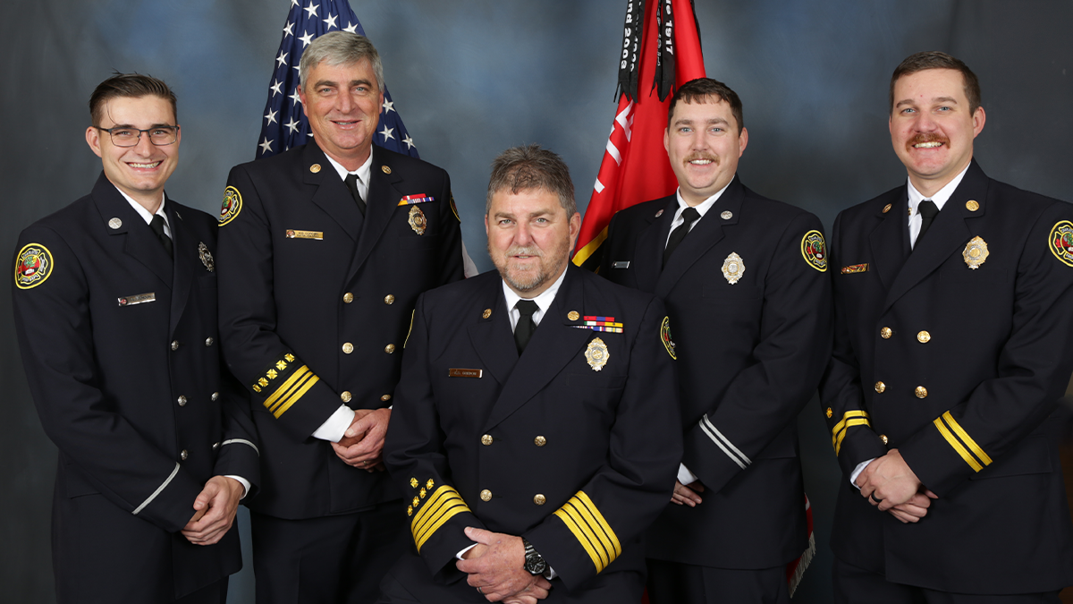 A proud firefighting family: Firefighter AJ Gordon, Battalion Chief (retired) Brent Gordon, Deputy Chief (retired) Kevin Gordon, Captain Zachary Gordon, and Captain Alex Gordon, continuing a legacy of service in Charlotte Fire. 