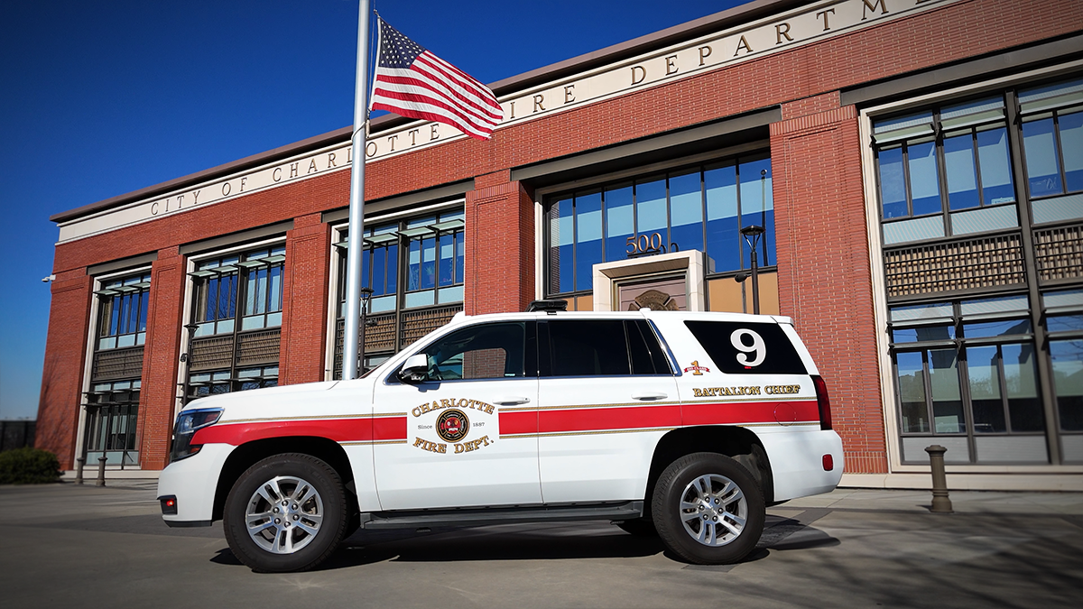 Battalion 9 command vehicle parked proudly in front of Charlotte Fire headquarters, symbolizing a commitment to innovation and service.