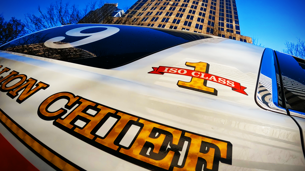 Battalion 9's vehicle set against the backdrop of Uptown Charlotte, a testament to readiness and growth.