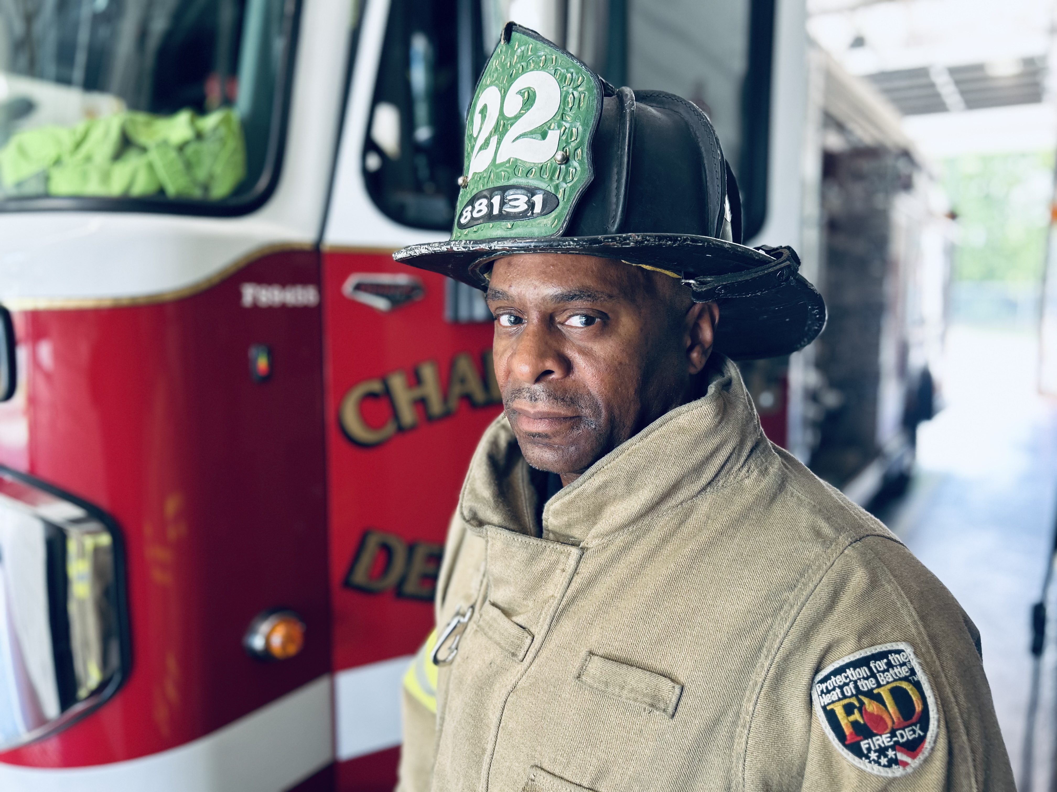 Rodman with his Engine 22 helmet, a symbol of identity and determination through his fight with prostate cancer. 