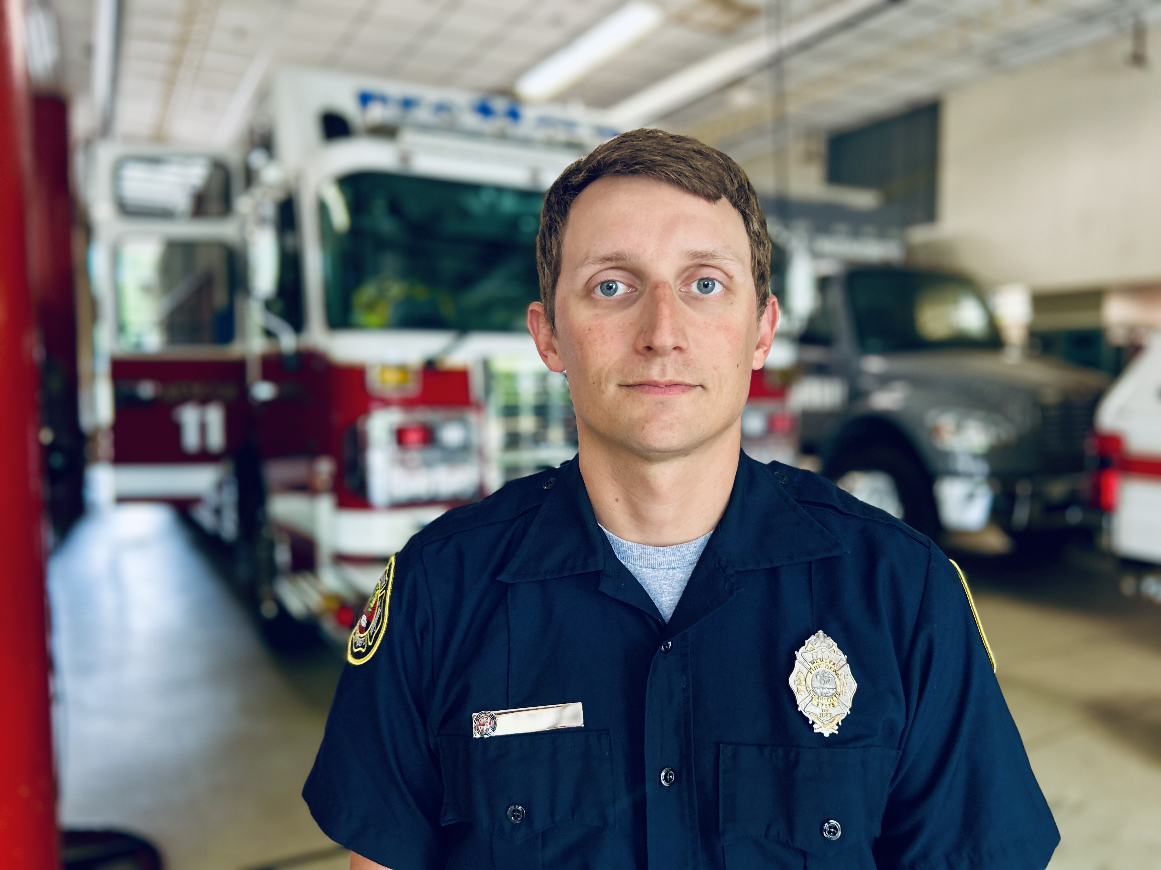 Firefighter Brian Watts of Rescue 11, recently named Charlotte Firefighter of the Year, stands ready at his firehouse in Charlotte. 