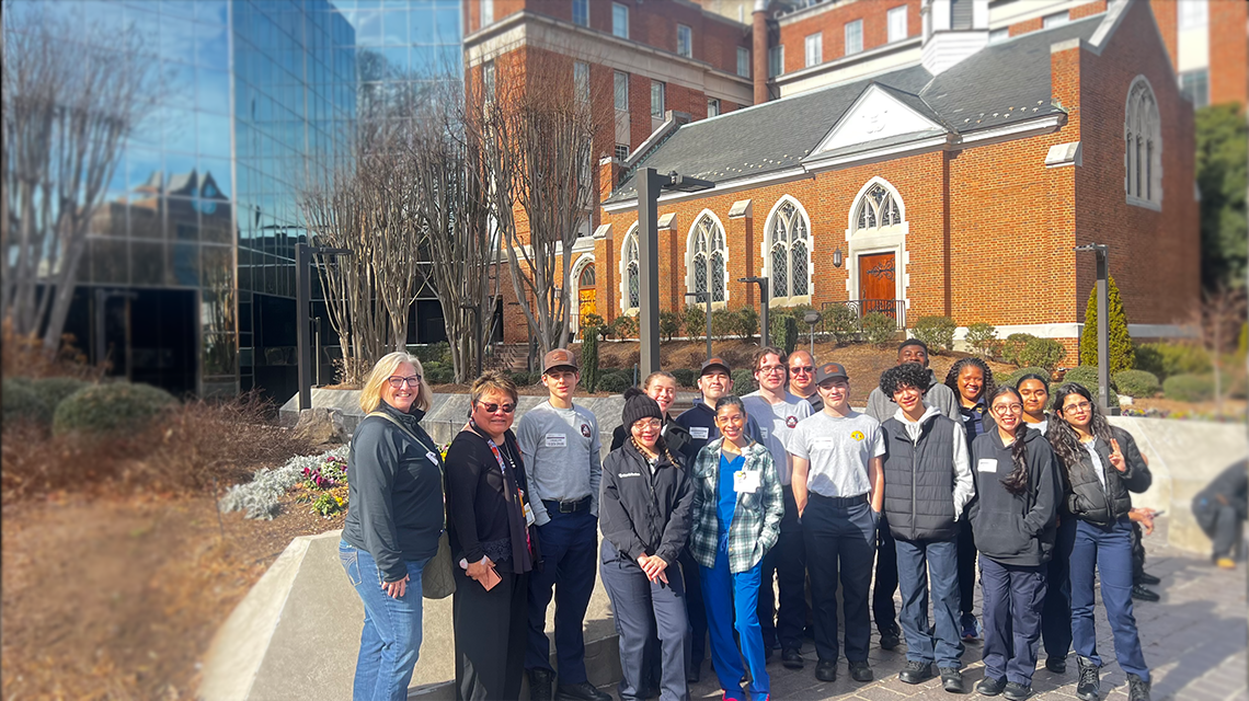 Charlotte Fire Explorers and members of the men and women of Charlotte Fire gather in Winston-Salem as part of a visit focused on burn care