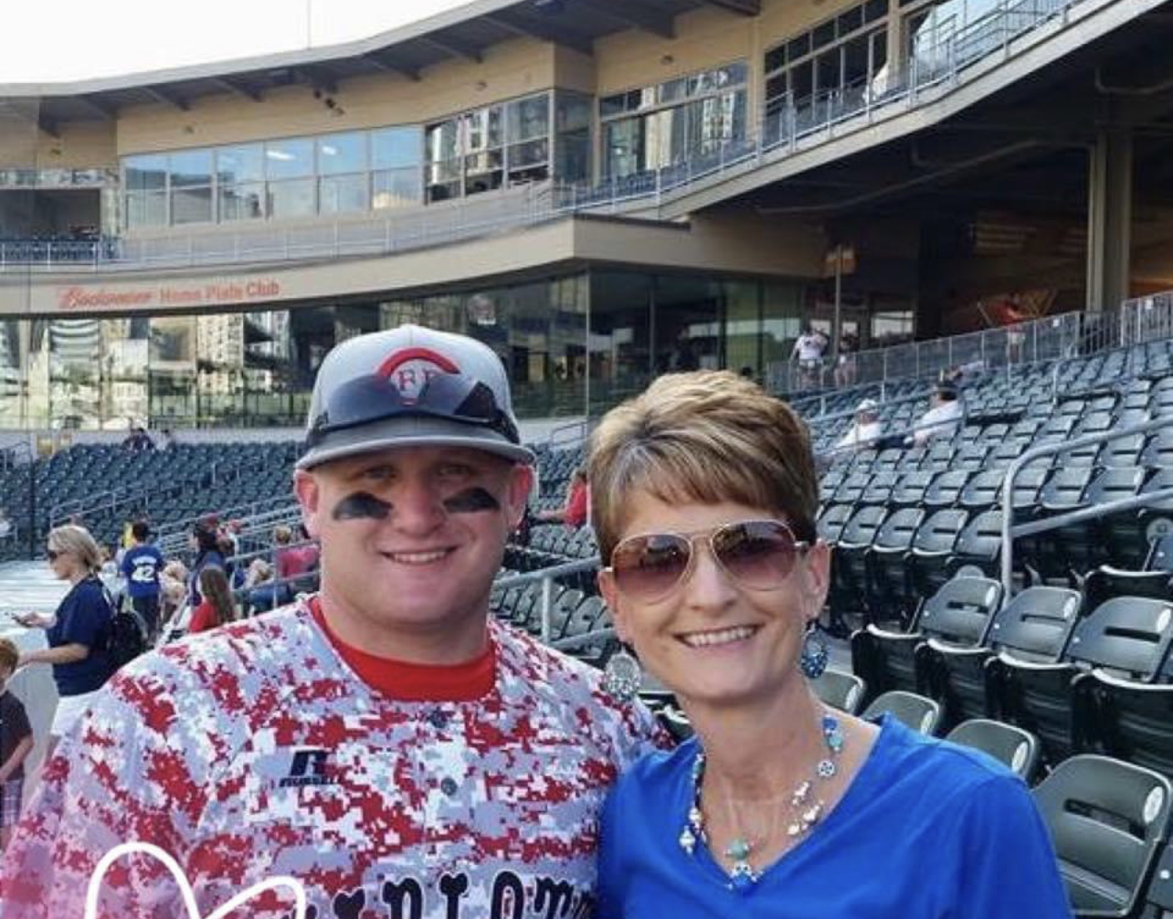 Cameron Ganous stands with his mother, Cindy Ganous, whose faith and strength continue to shape his life and service.