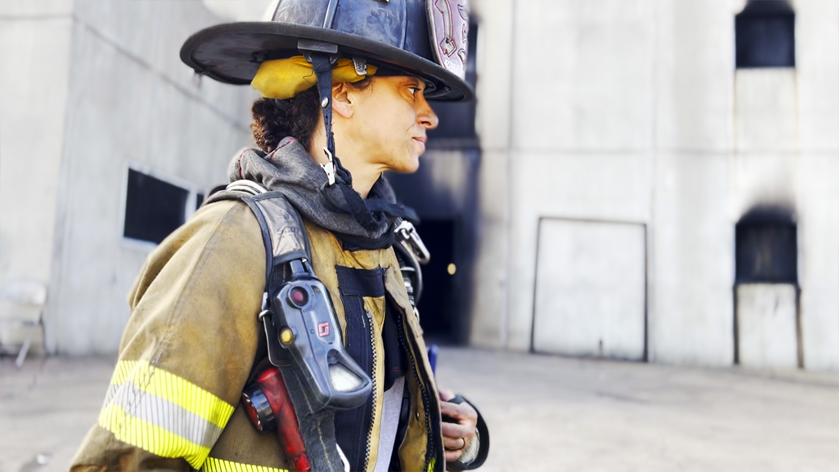 Stepping into the fire service means stepping into a lifelong commitment. Chantal Williams takes a moment before a training evolution, mentally preparing for the work ahead.