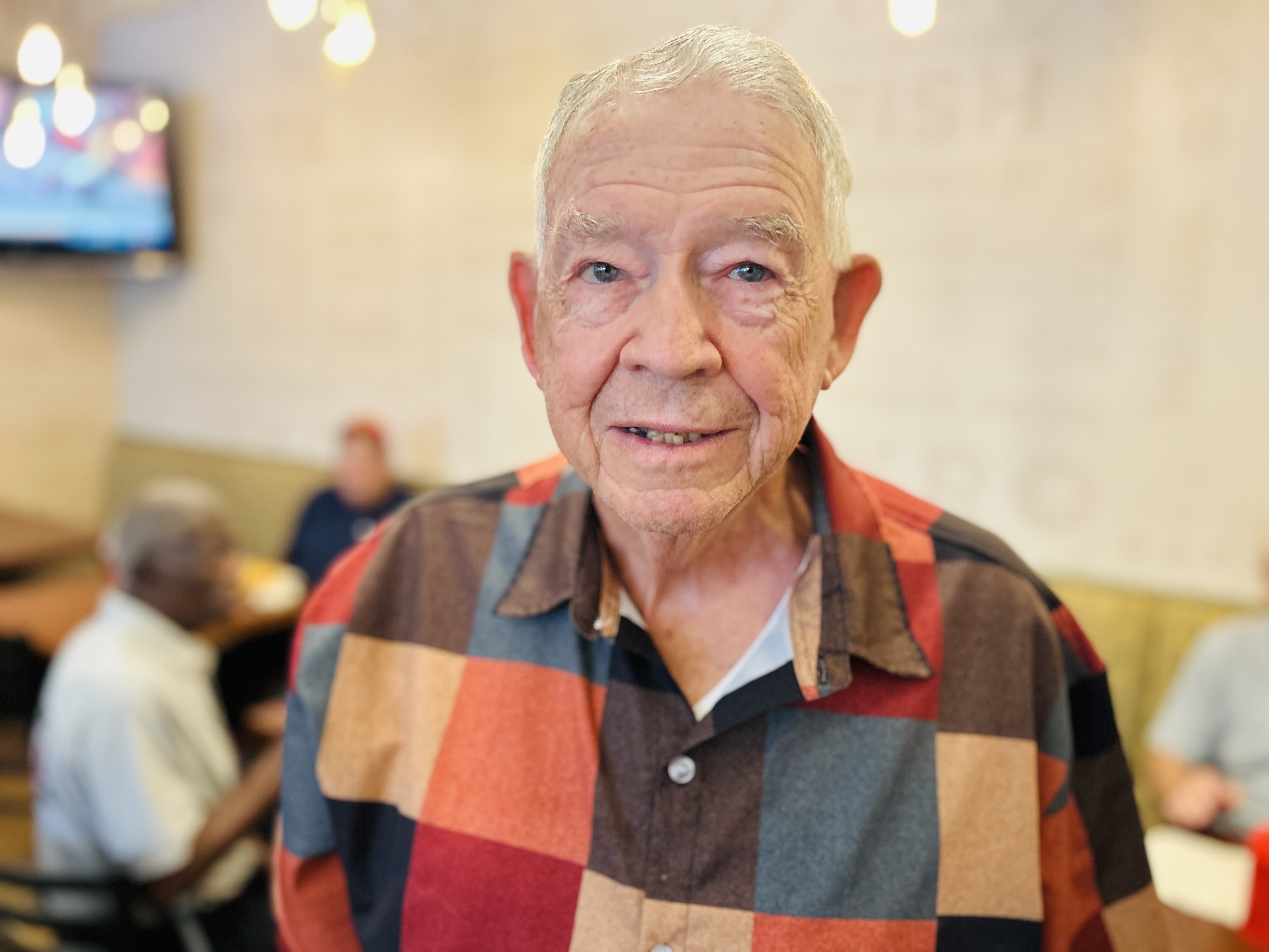 Former Charlotte Fire Chief Luther Fincher, who once led the department, joins the gathering to reconnect with firefighters from across generations