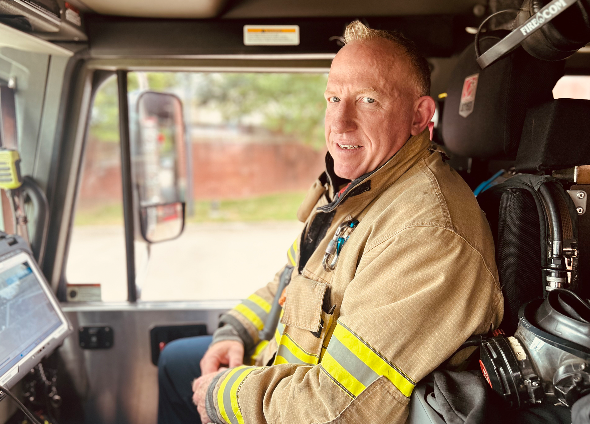 Bowman in the cab of Engine 10, ready for the next call and always prepared for the next challenge. 
