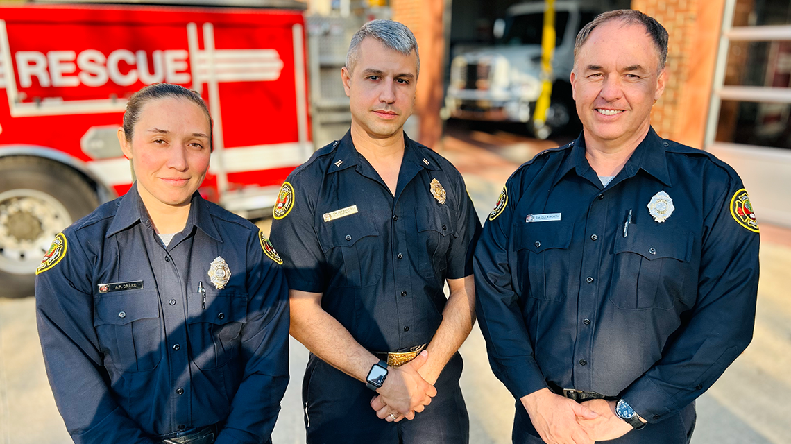The crew of Firehouse 32: Firefighter A.K. Drake, Captain Tommy DeFrancisci, and Engineer L.A. Duckworth. DeFrancisci leads Charlotte Fire’s hazmat unit with precision and pride.