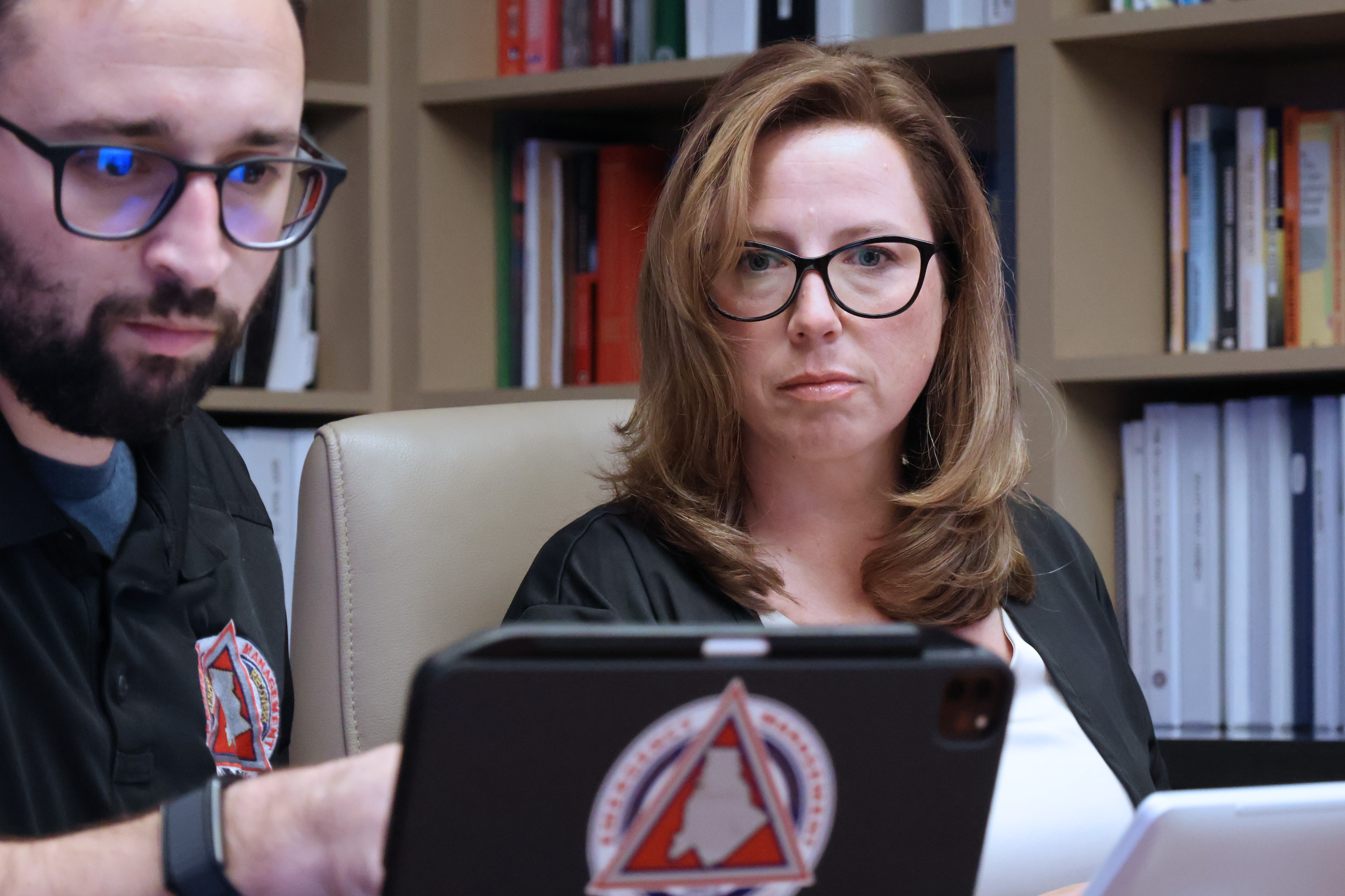 Radiological Emergency Preparedness Planner Ashley Riggins, right, works with Daniel Glaser-Reich as part of the team responsible for preparing Charlotte-Mecklenburg for a wide range of emergencies and complex incidents.