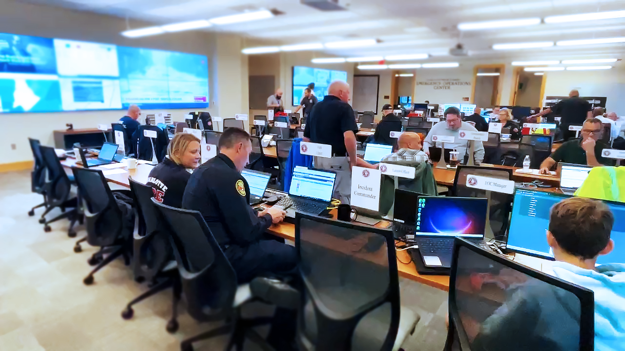 Representatives from multiple agencies work inside the Emergency Operations Center during the Hurricane Ian activation.