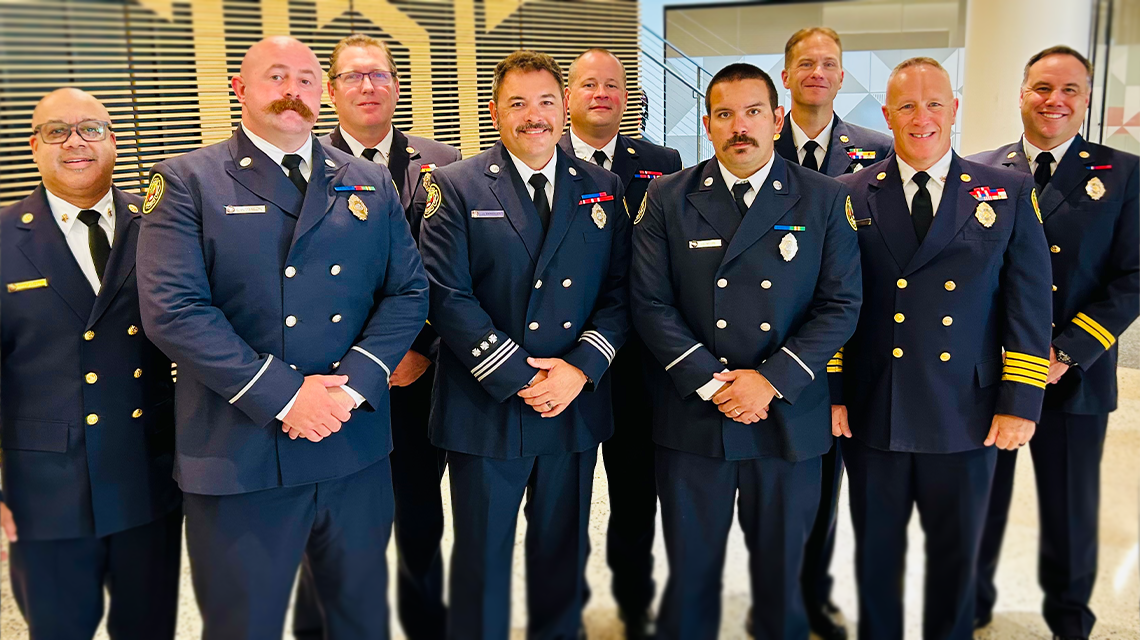 Surrounded by Charlotte Fire leadership, members of Engine 15 are honored for their heroic actions during the April 29 active shooter incident.