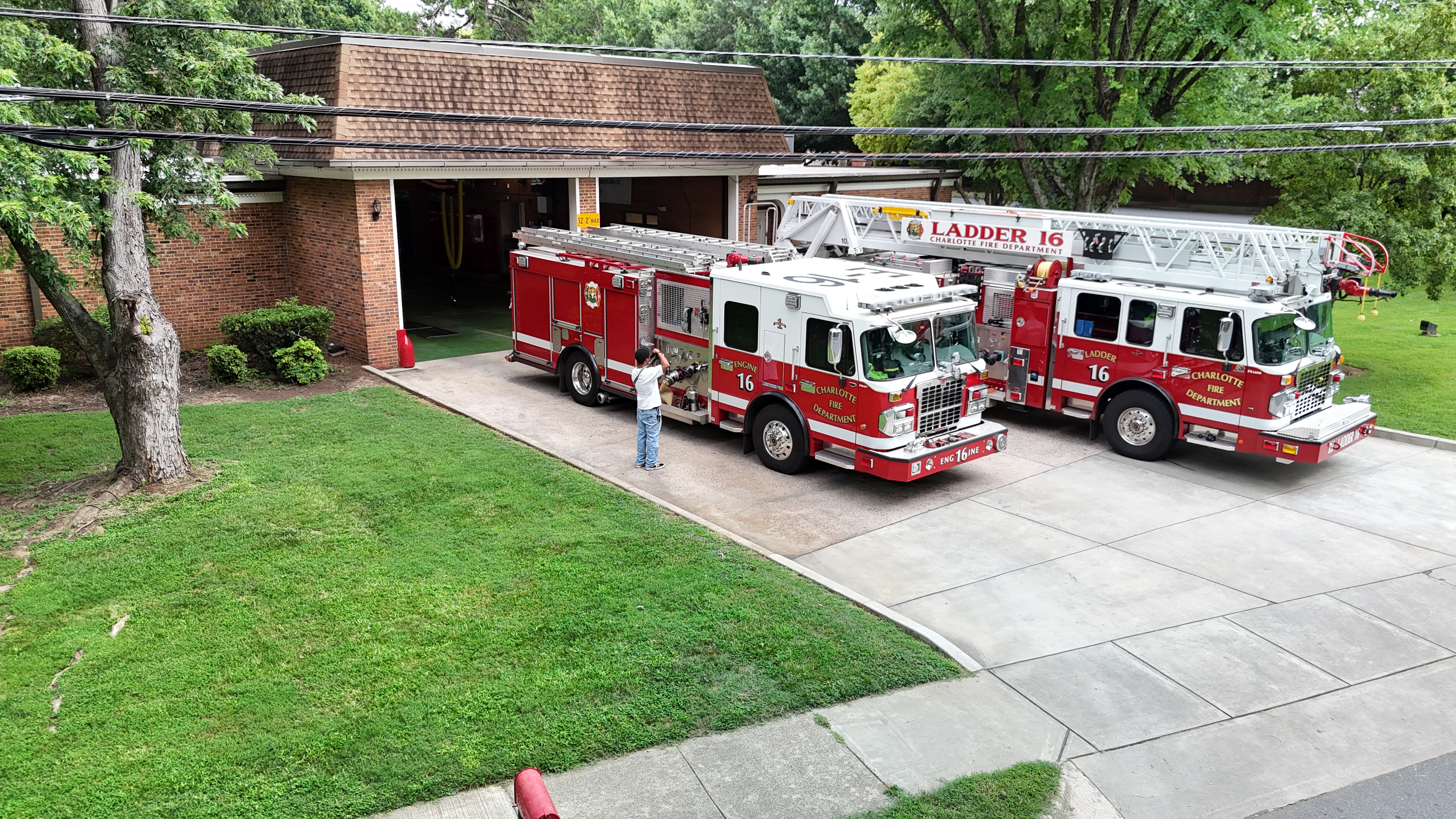 Engine 16 and Ladder 16 sit outside Firehouse 16 on Park South Drive.