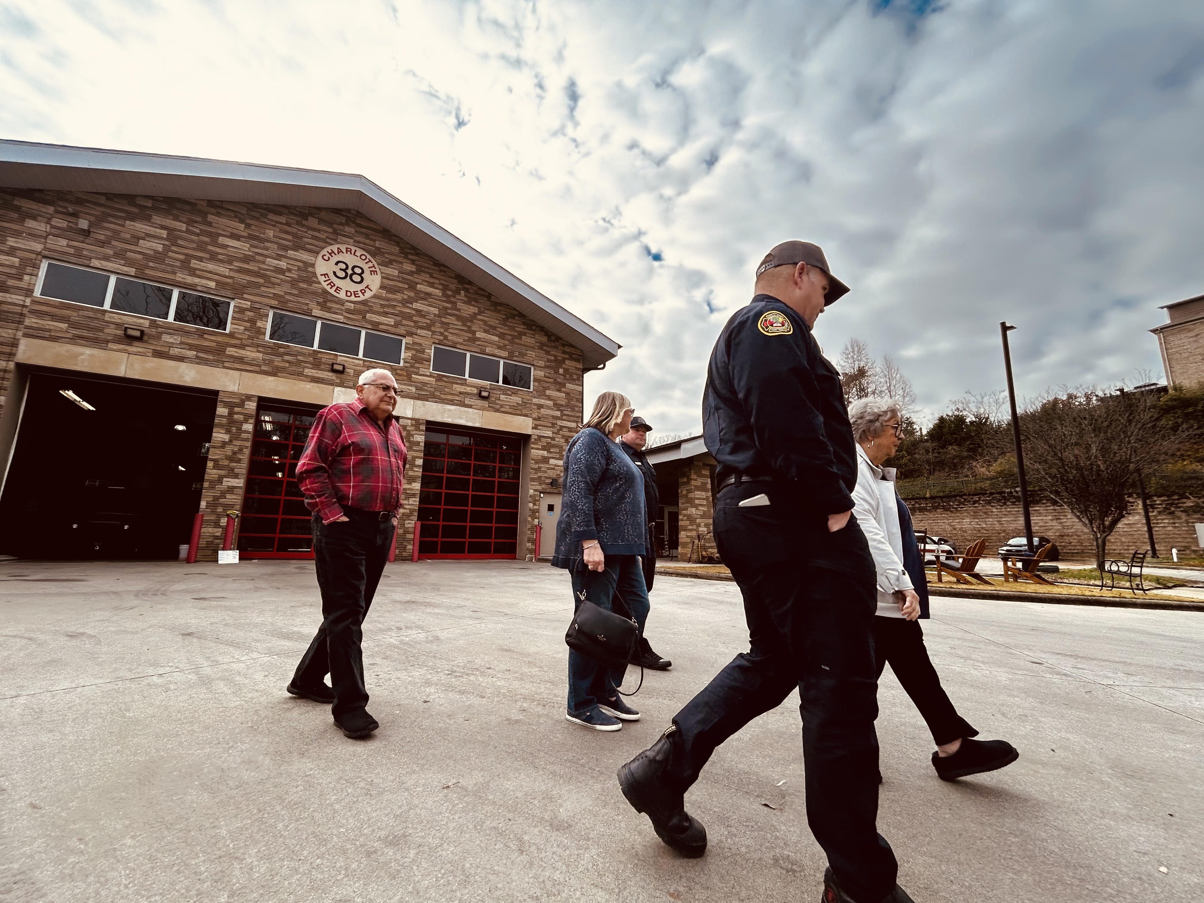 Darlene walks through Firehouse 38 with her family as firefighters share more about the station and the work they do each day. 