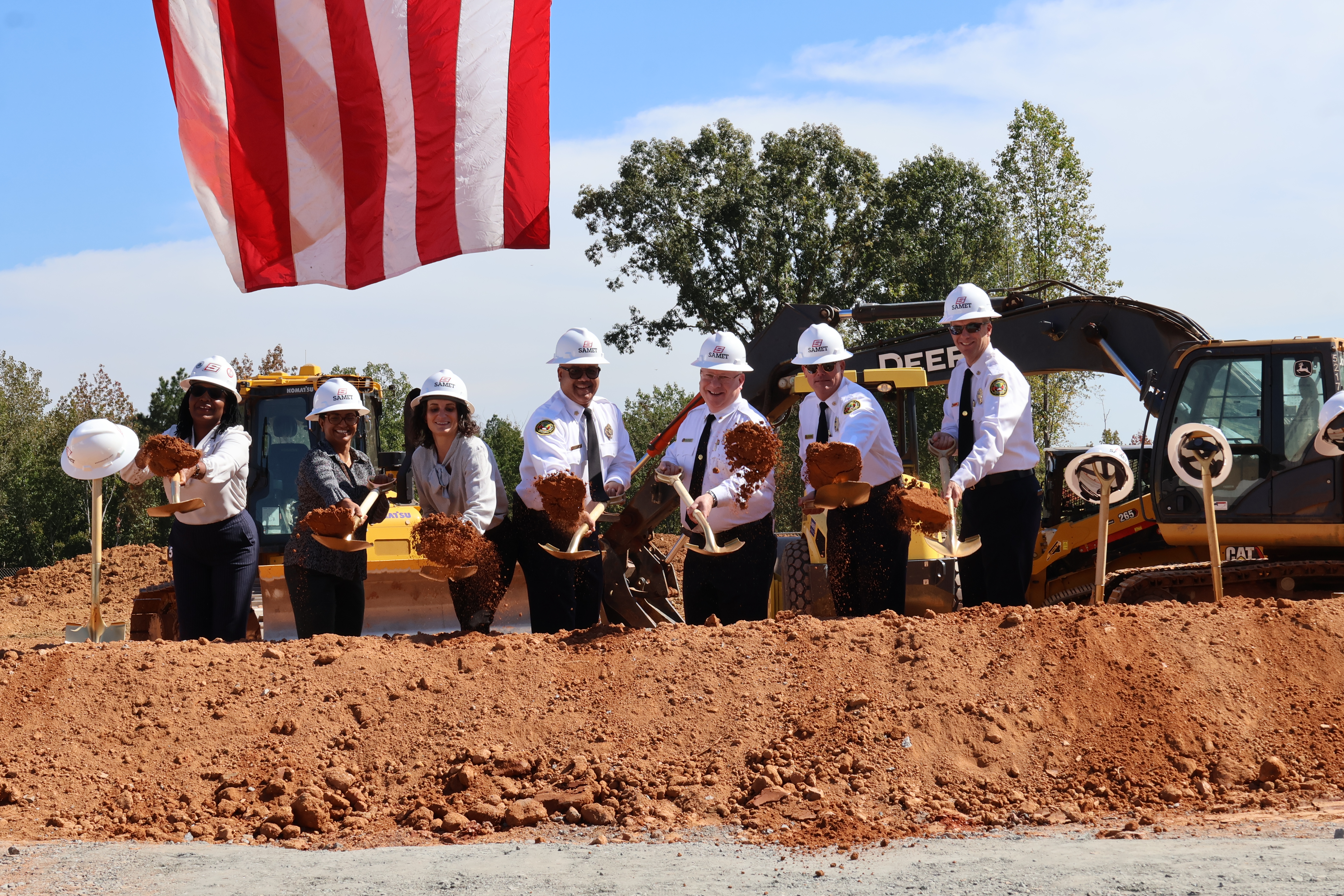 Charlotte Fire leadership and planning celebrate the start of construction.