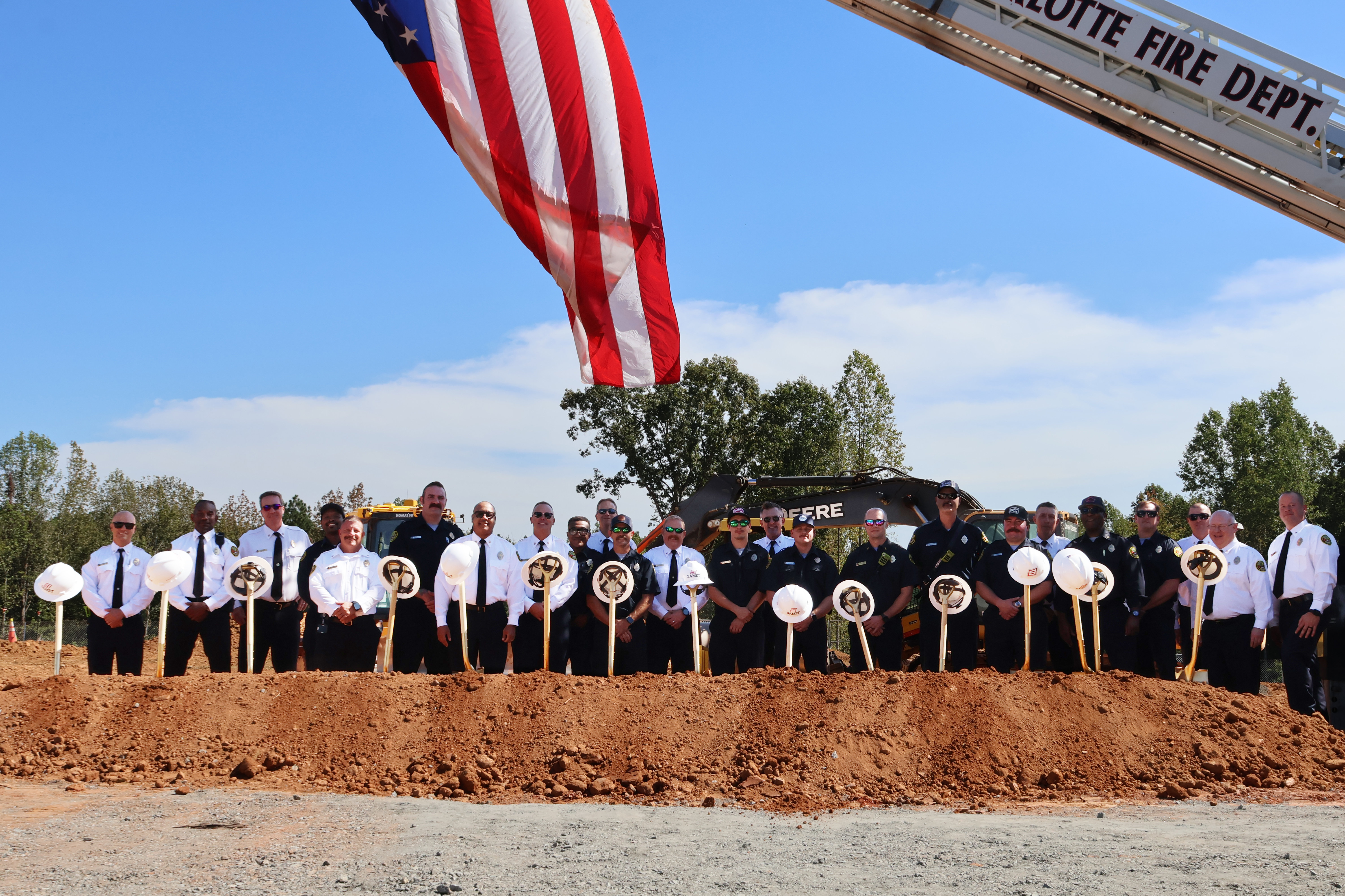 Charlotte Fire members gather at the site of the future Firehouse 44.
