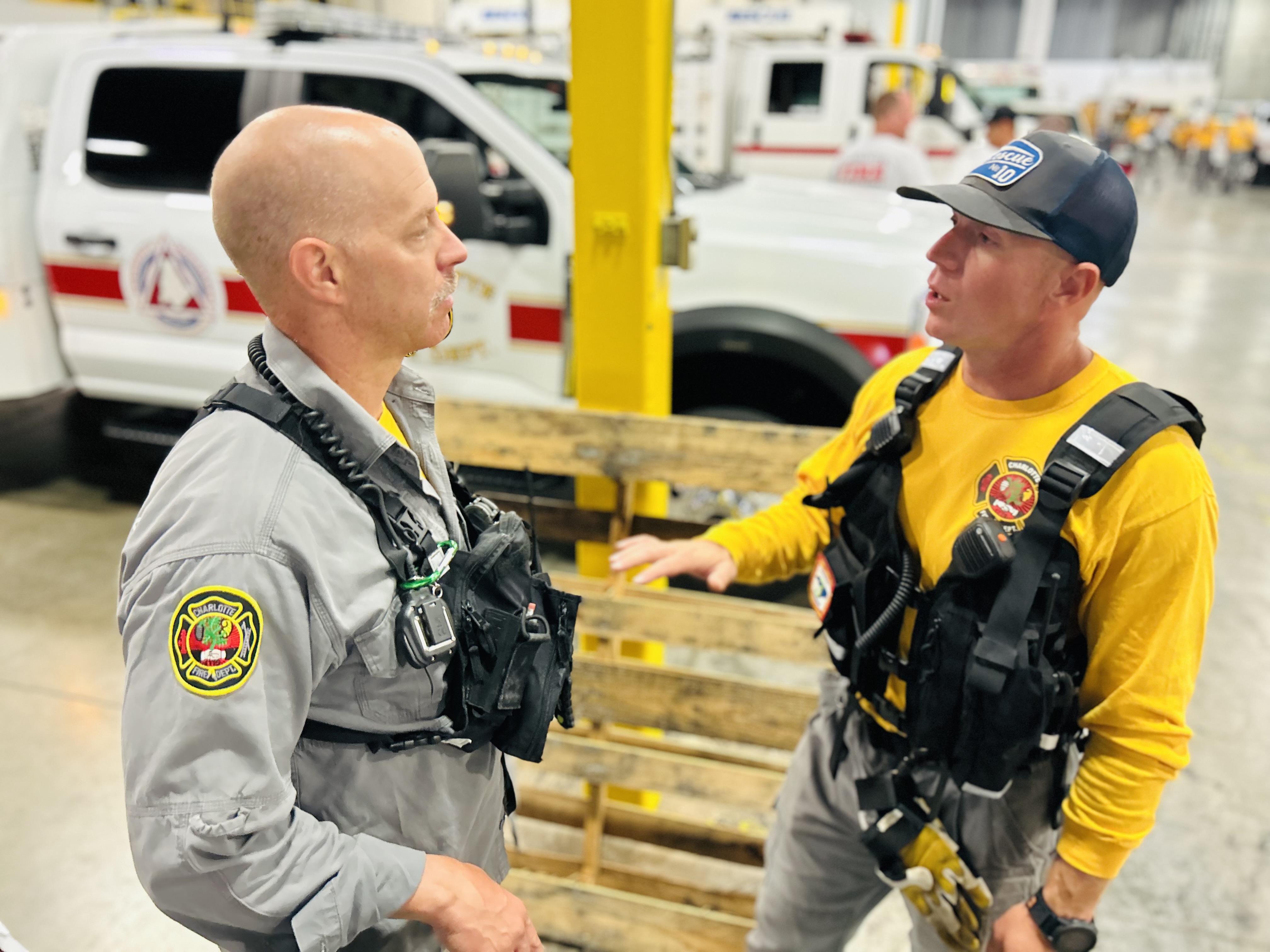 Capt. DePoto and Firefighter Bell review logistics ahead of Task Force 3’s departure.