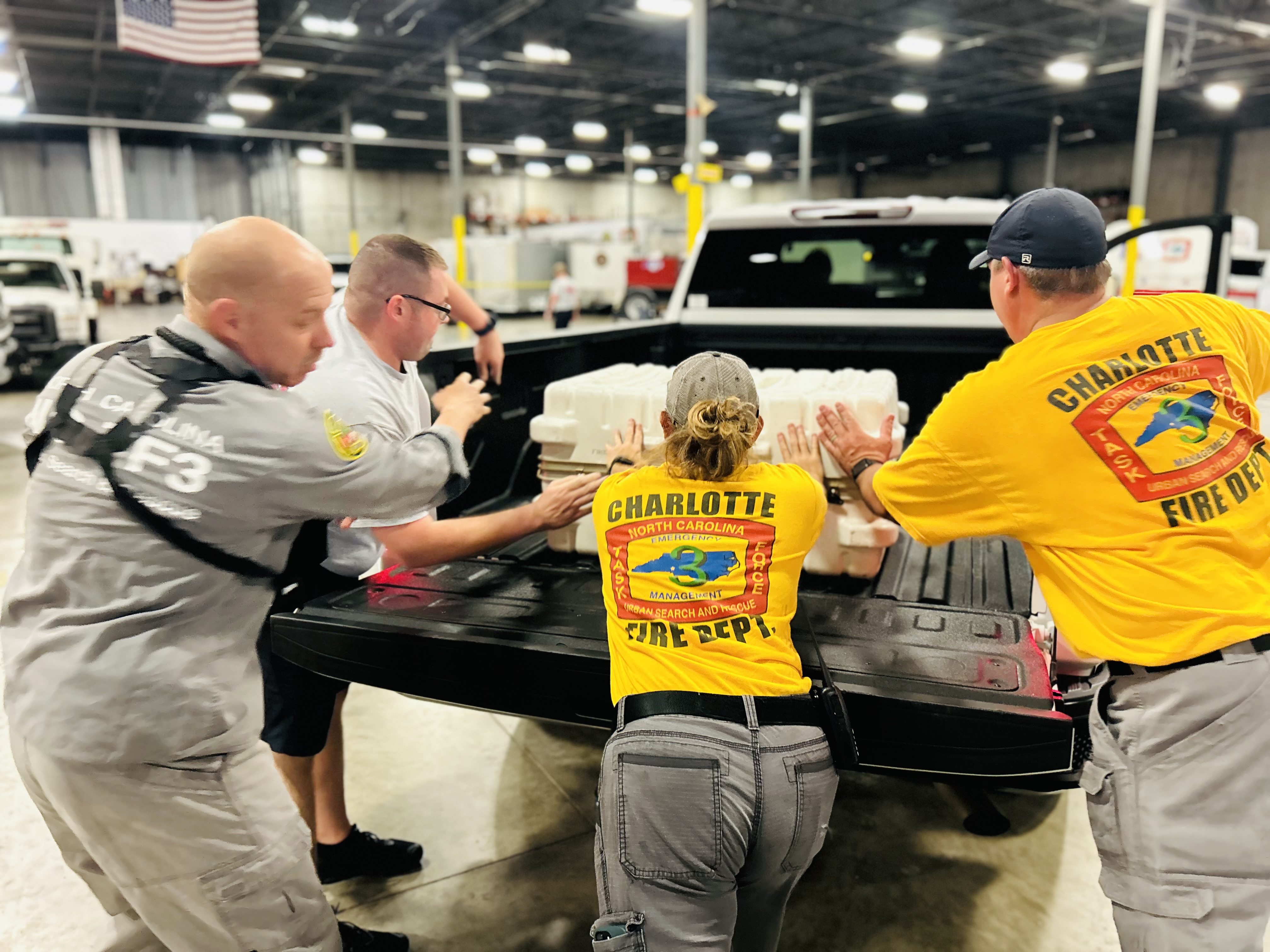 Charlotte Fire’s Task Force 3 members work together to load critical equipment ahead of their Hurricane Erin deployment. The coordinated effort reflected their commitment to readiness and rapid response. 