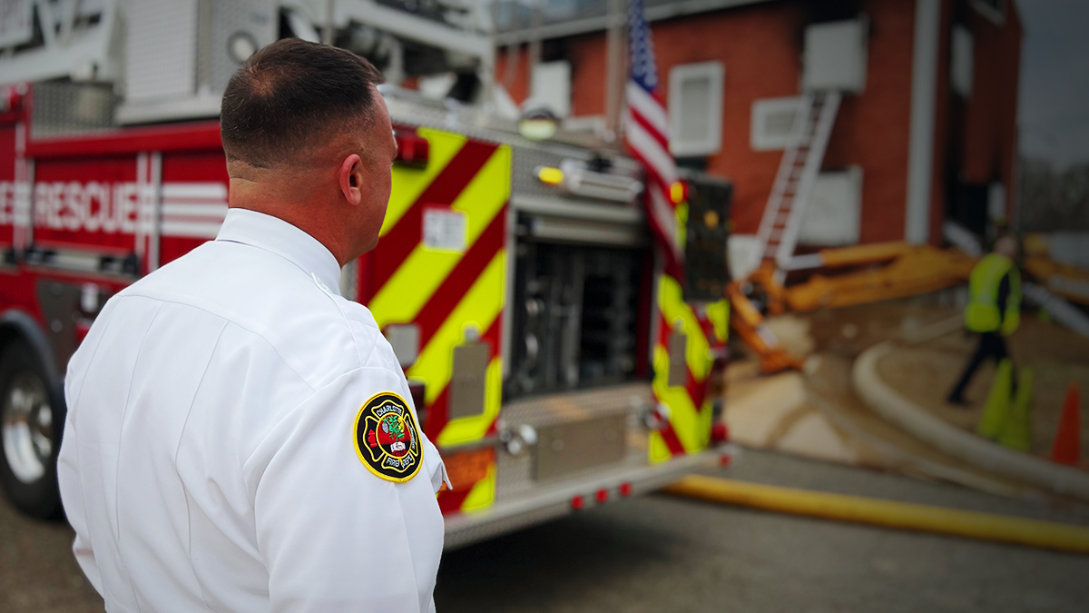 Watching over a training scenario, Richardson ensures firefighters are prepared for real-world emergencies.