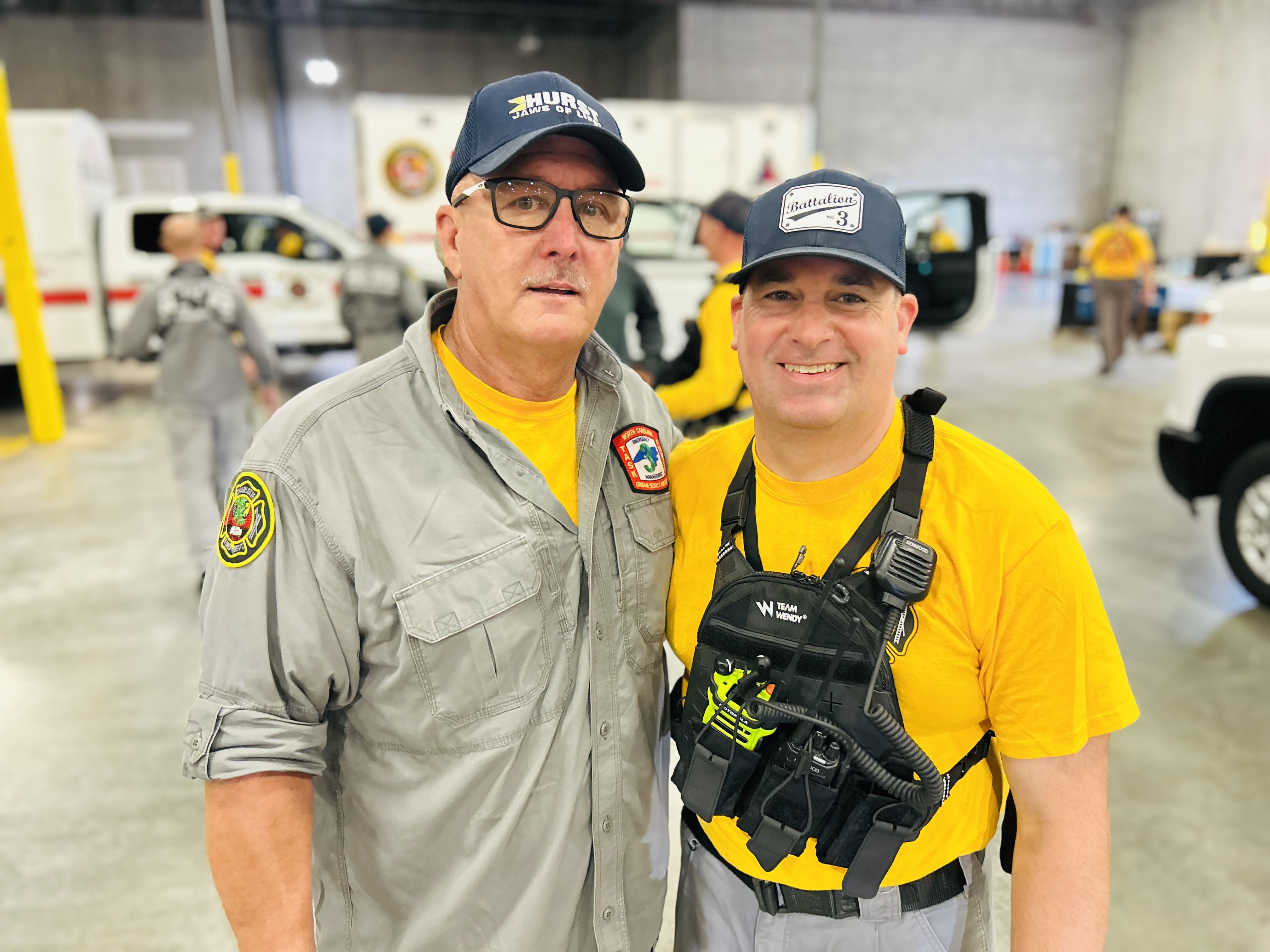 Rodgers shares a moment with Battalion Chief Jeremy Monteith during a Task Force 3 training session. Monteith calls him the model of what a Charlotte firefighter should be.