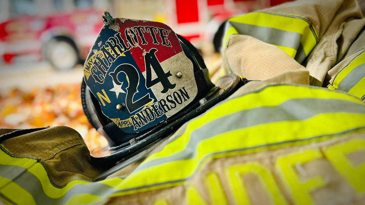 Anderson’s helmet, a symbol of the grit and courage required in the face of intense fire conditions.