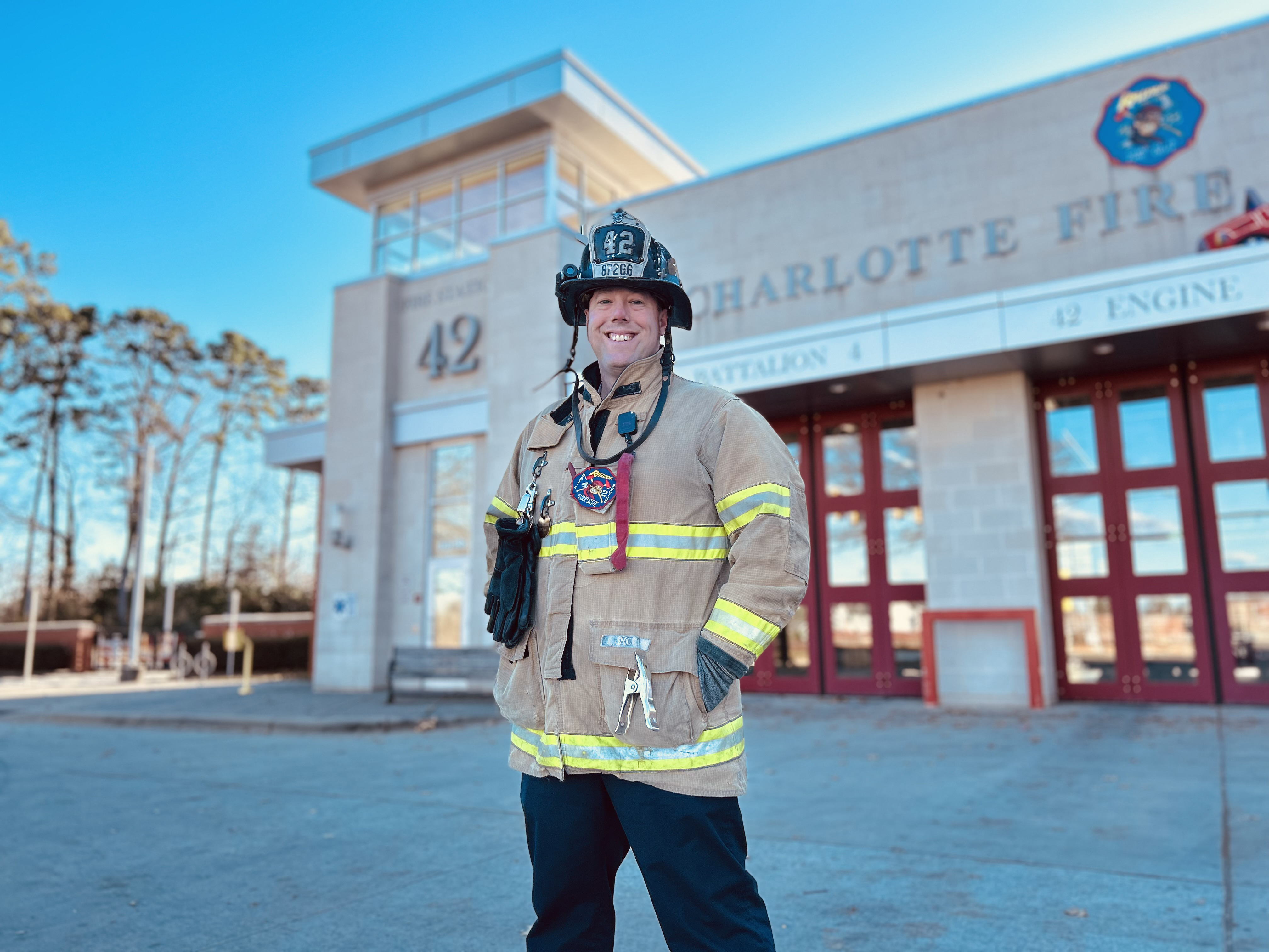 Standing outside Firehouse 42, Capt. Lee Bright represents the intersection of family, service, and survival that defines his story.