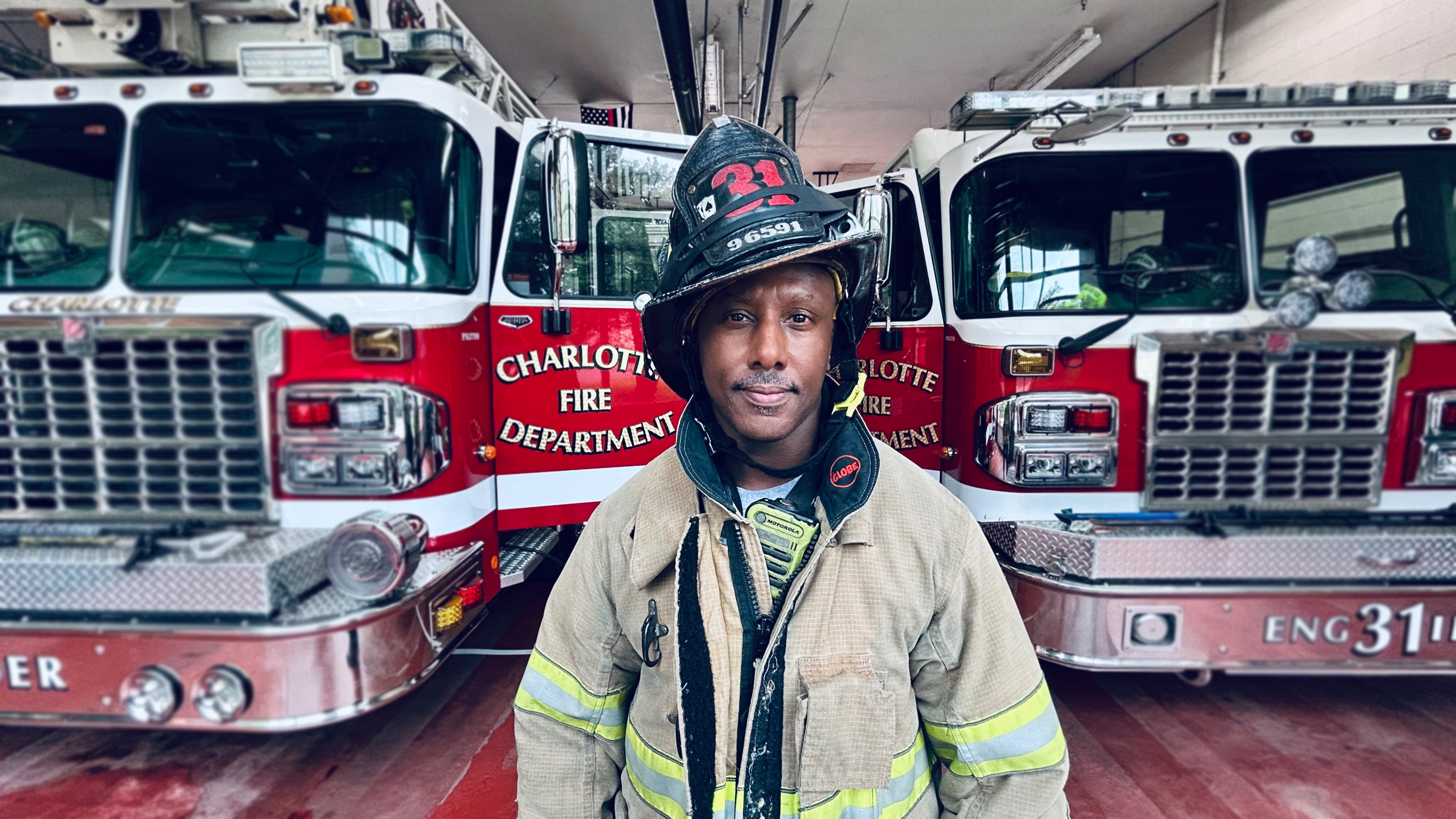 Engine 31 and Ladder 31 inside the bay at Charlotte Firehouse 31, where Meylor is back to full duty.