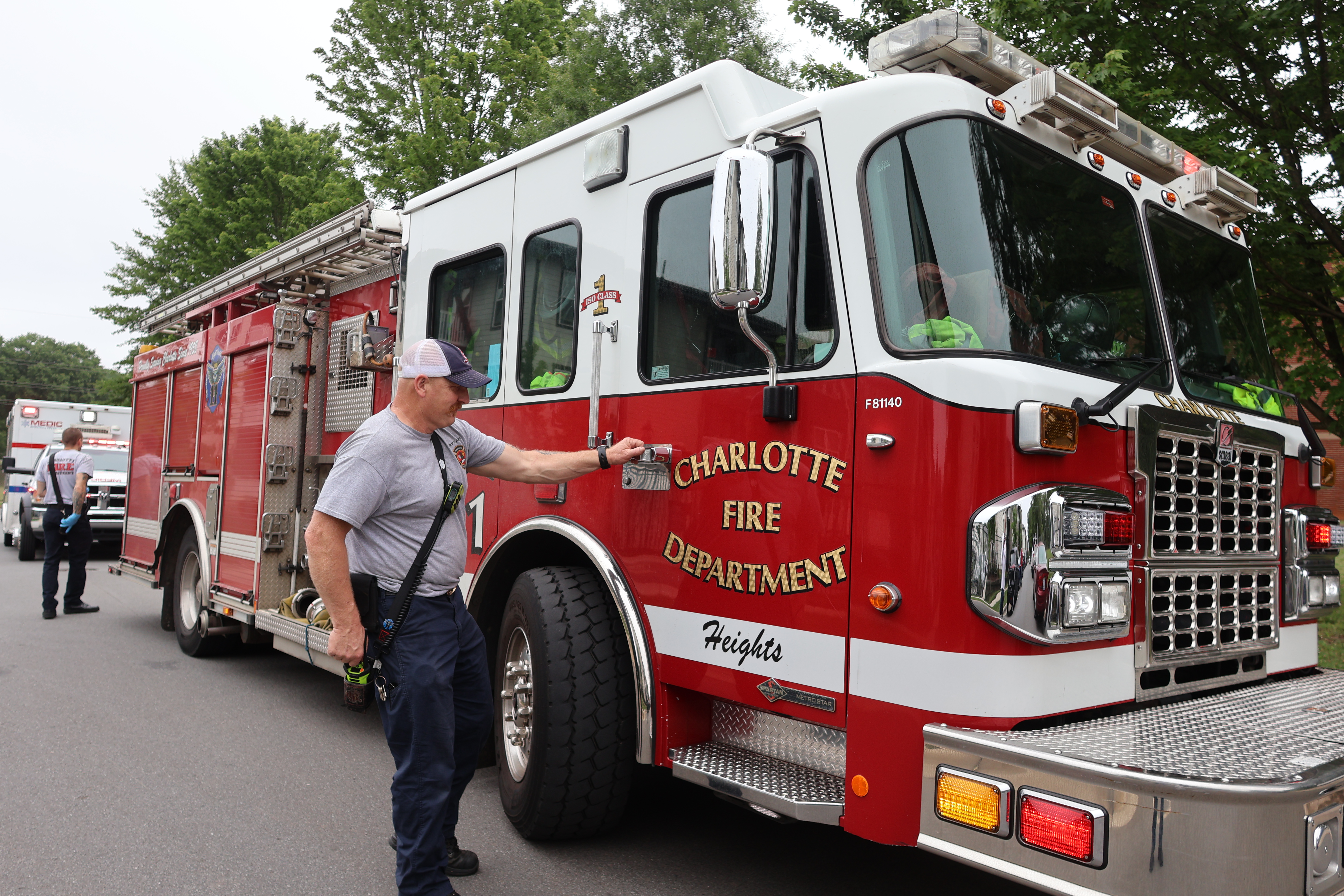 Feneis returns to the captain’s seat of Engine 11 after helping a Charlotte resident during a medical emergency response.