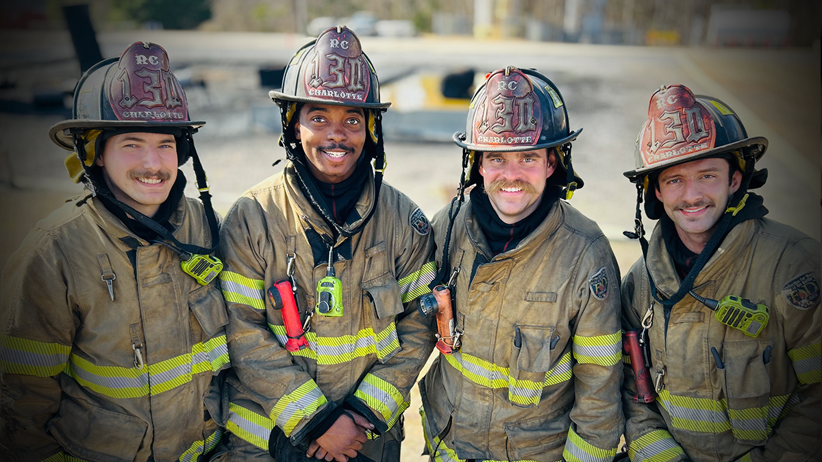 Charlotte Fire Recruits Michael Allegrati, Nicolas Adade, Joseph Burch, and Dustin Arney—brothers in training, soon to be brothers in service.