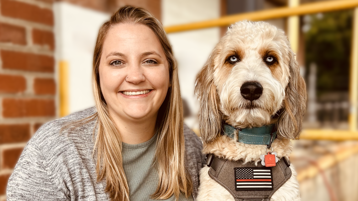 Behavioral Health Specialist Nicole Burg and therapy dog Asher are key figures in Charlotte Fire’s mental health support network—breaking down barriers and building trust across the department.