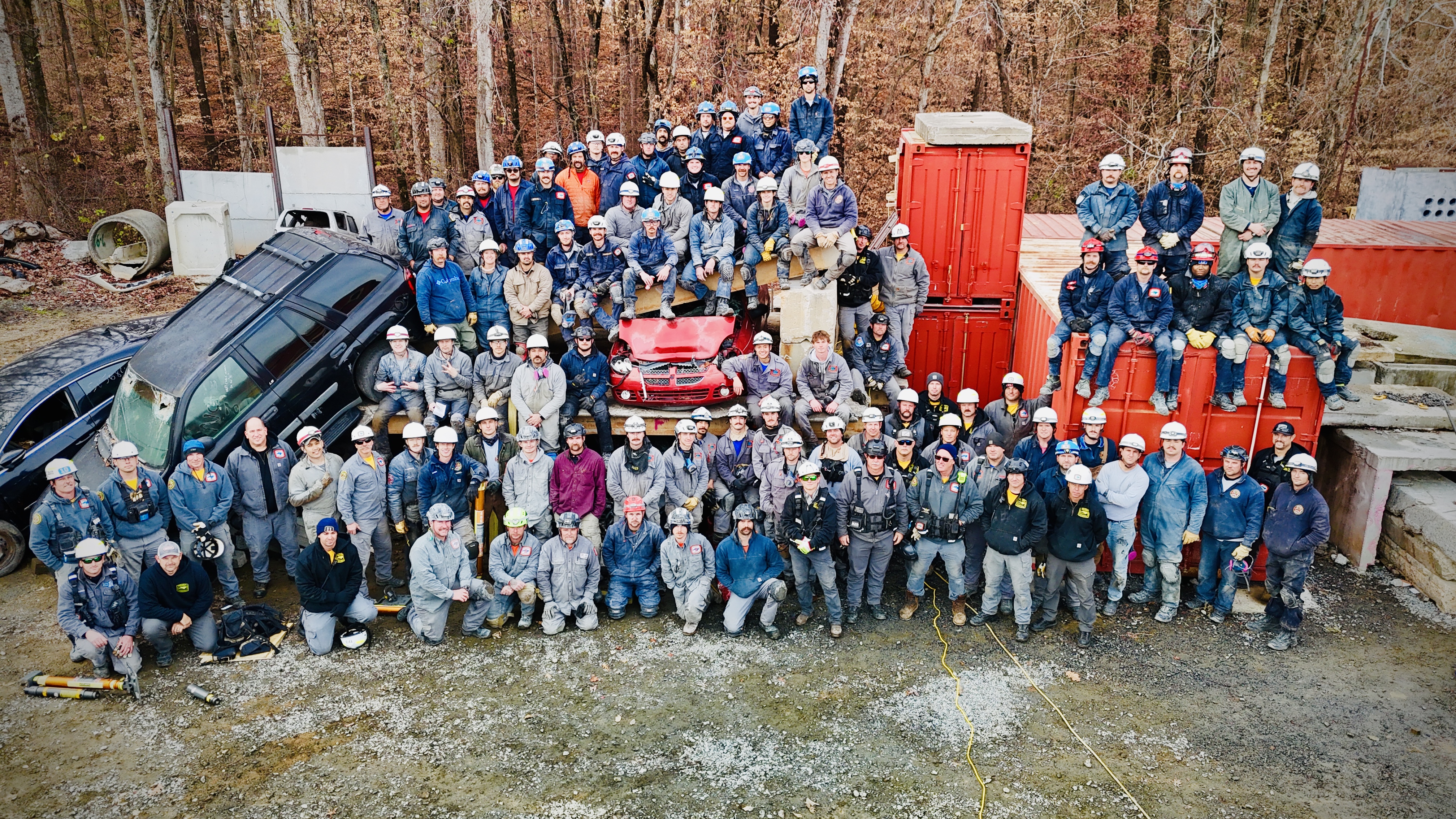 Firefighters from across North Carolina pose for a group photo during the 2025 Structural Collapse Technician School at the Charlotte Fire Training Academy.
