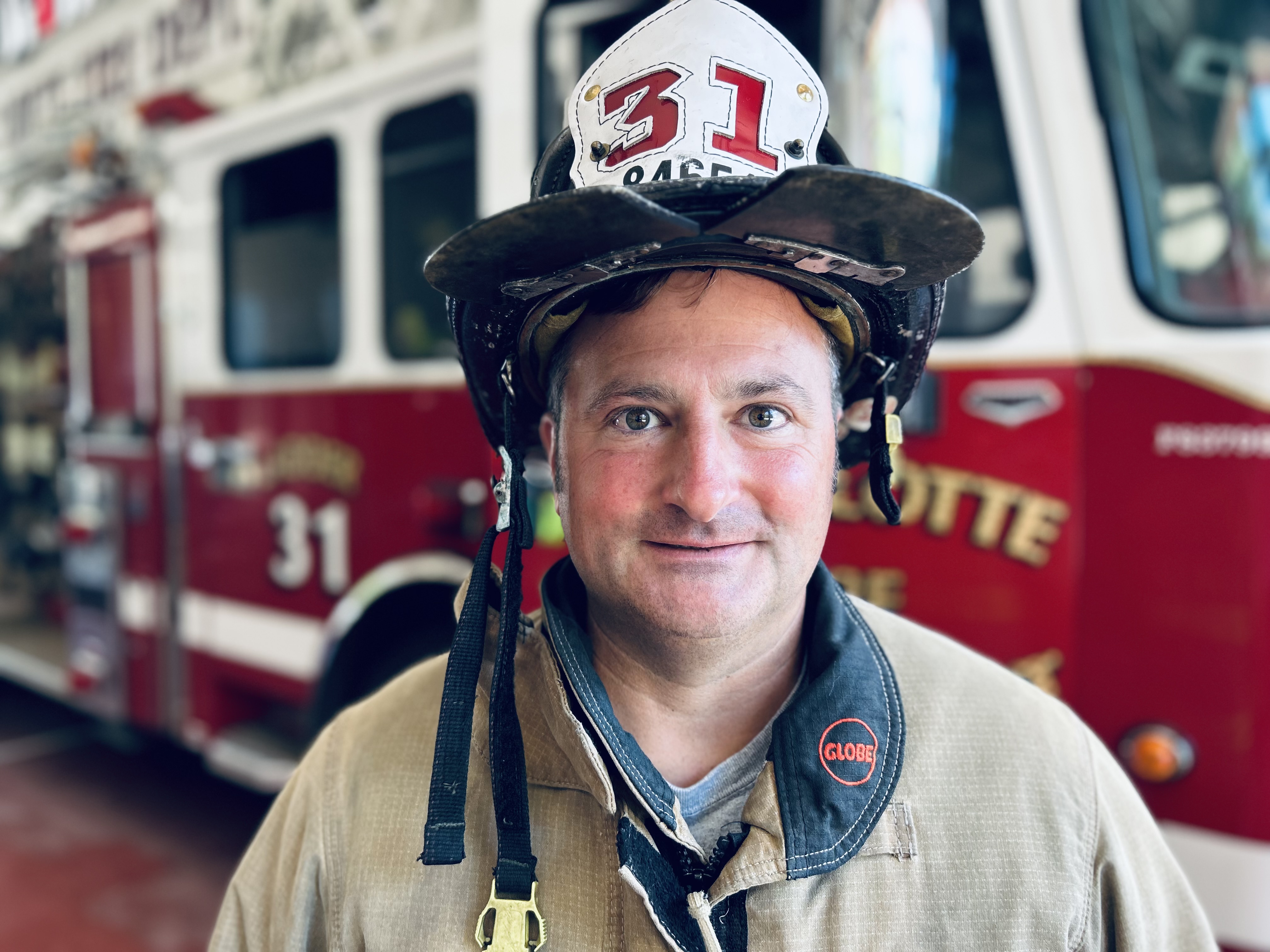 Wearing his traditional helmet, Capt. Harwell shows both his decades of service and the determination it took to move through his cancer journey. 