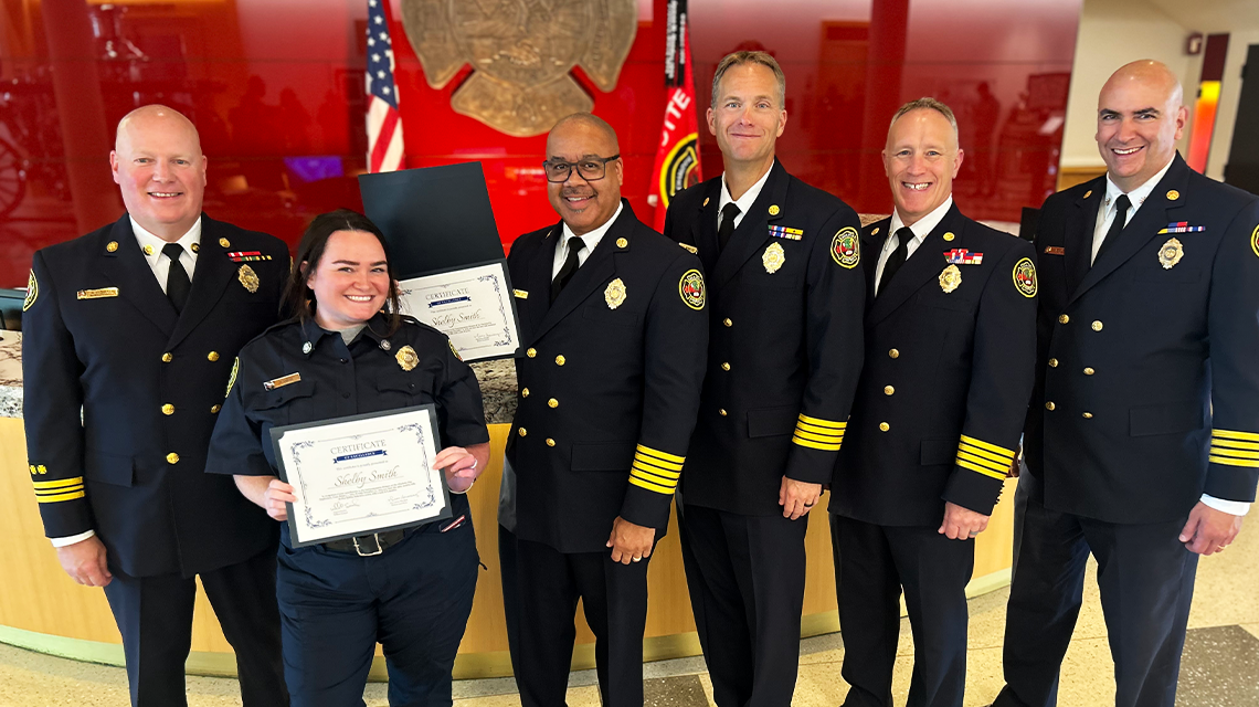 Shelby Smith receives recognition alongside Communications Superintendent and Charlotte Fire Command Staff for her outstanding call volume.