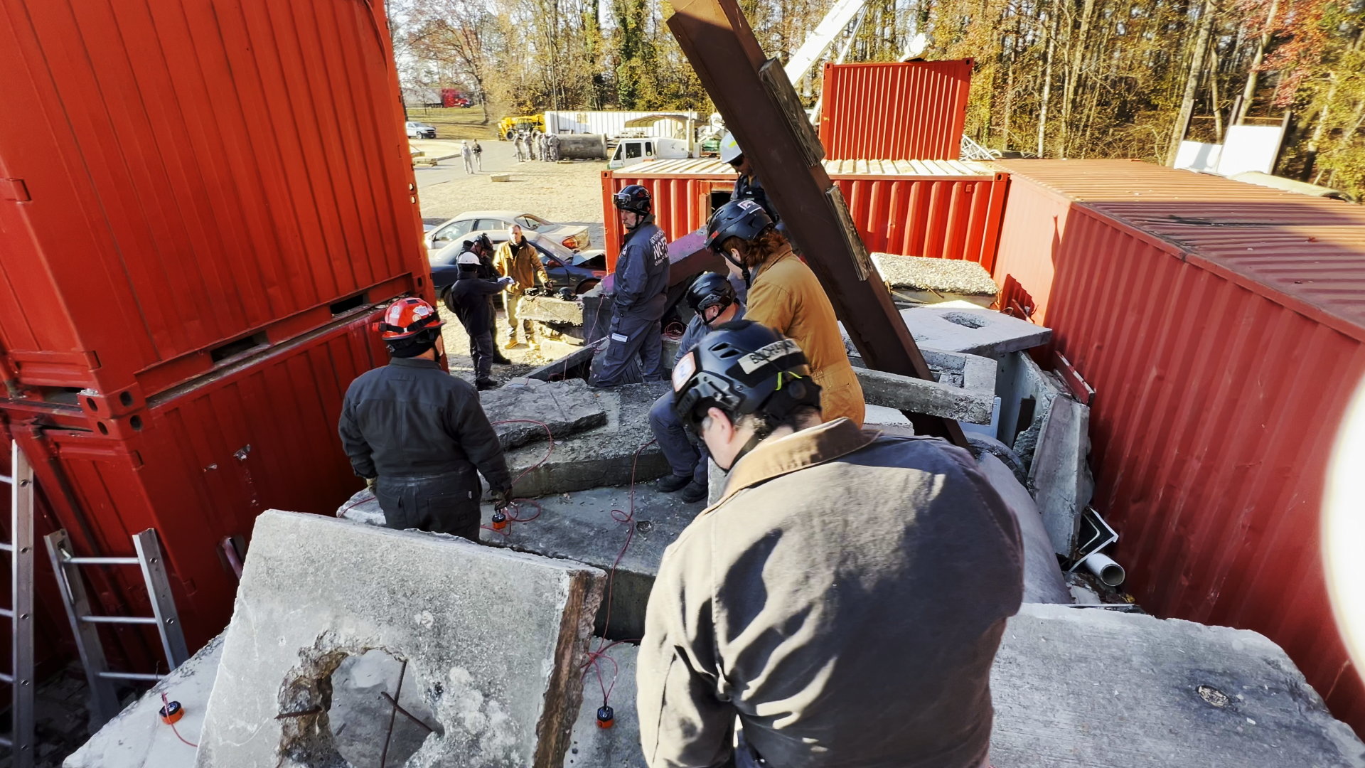 Firefighters carefully maneuver concrete and steel elements, refining their skills in stabilization and rescue operations. This part of the training ensures readiness for high-risk scenarios encountered in real emergencies. 