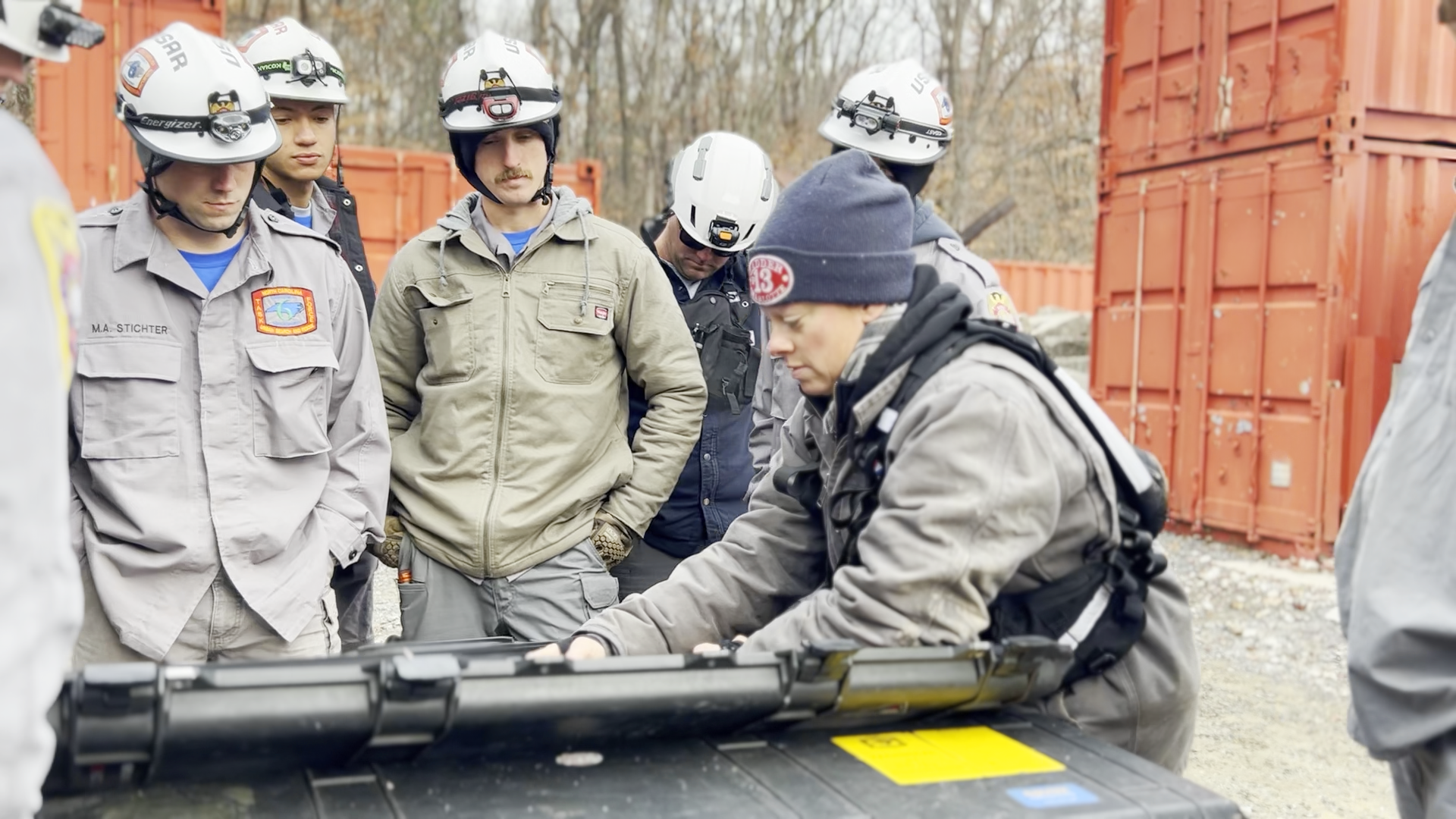 Charlotte Fire Instructor Firefighter Tawni Chambers walks students through specialized rescue equipment used in structural collapse incidents. 