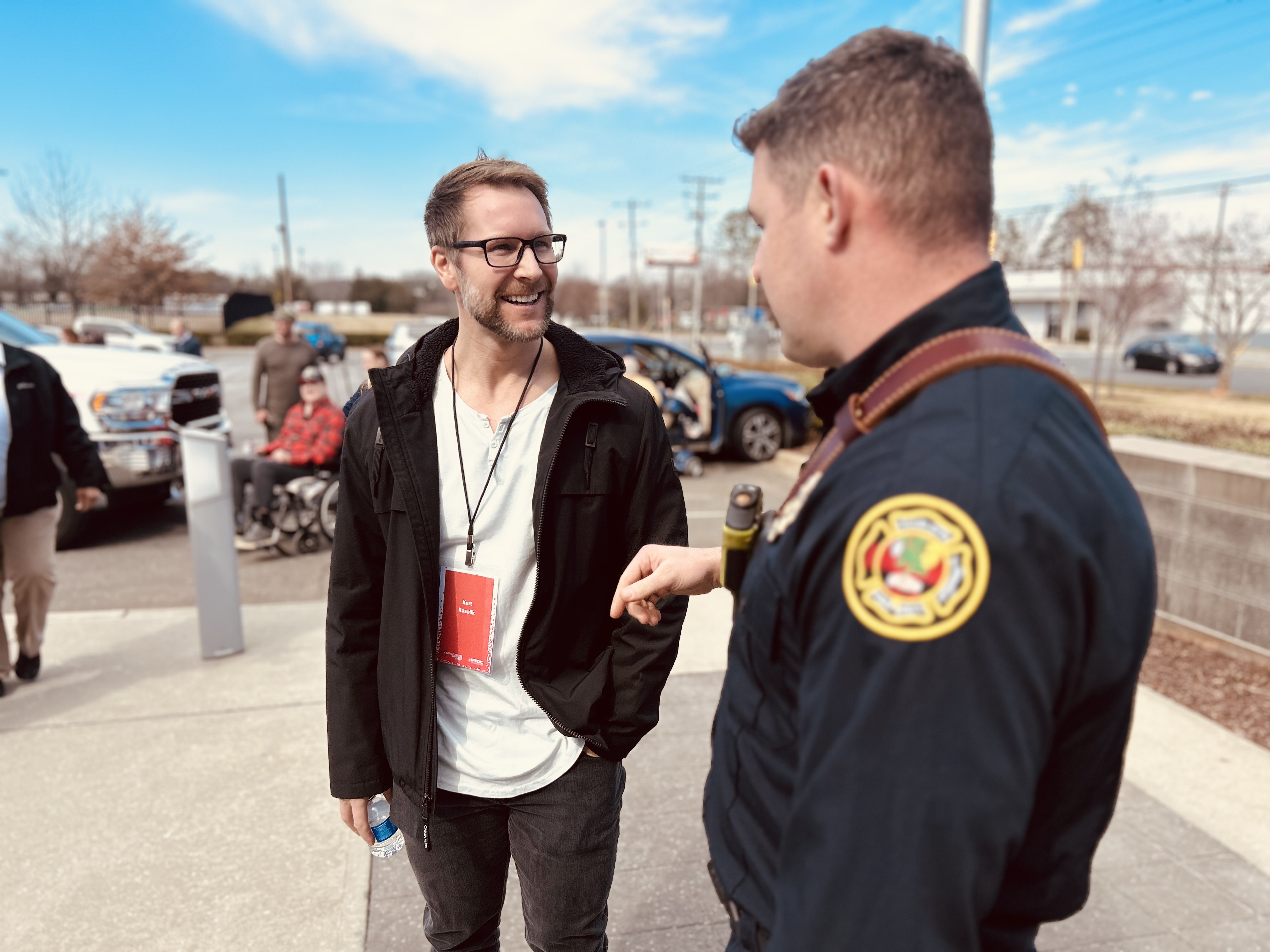 Kurt Rosalik shares a moment with Captain Travis Phillips during Saturday’s Cardiac Survivors Event. 