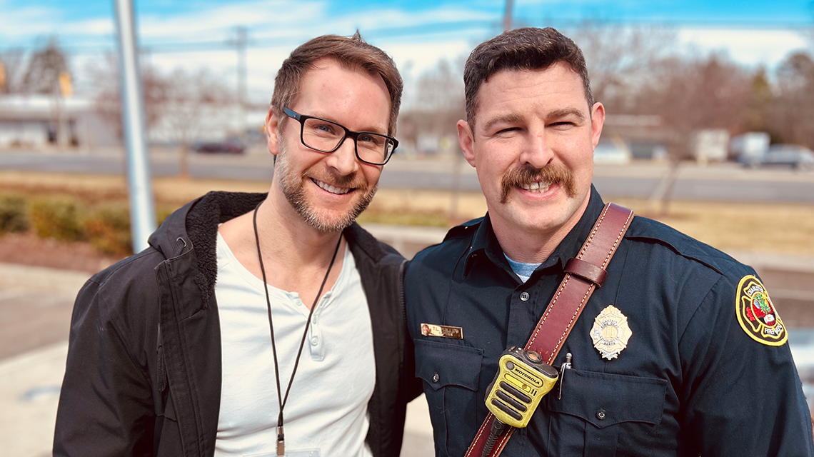 Kurt Rosalik and Captain Travis Phillips reunite outside the event. 