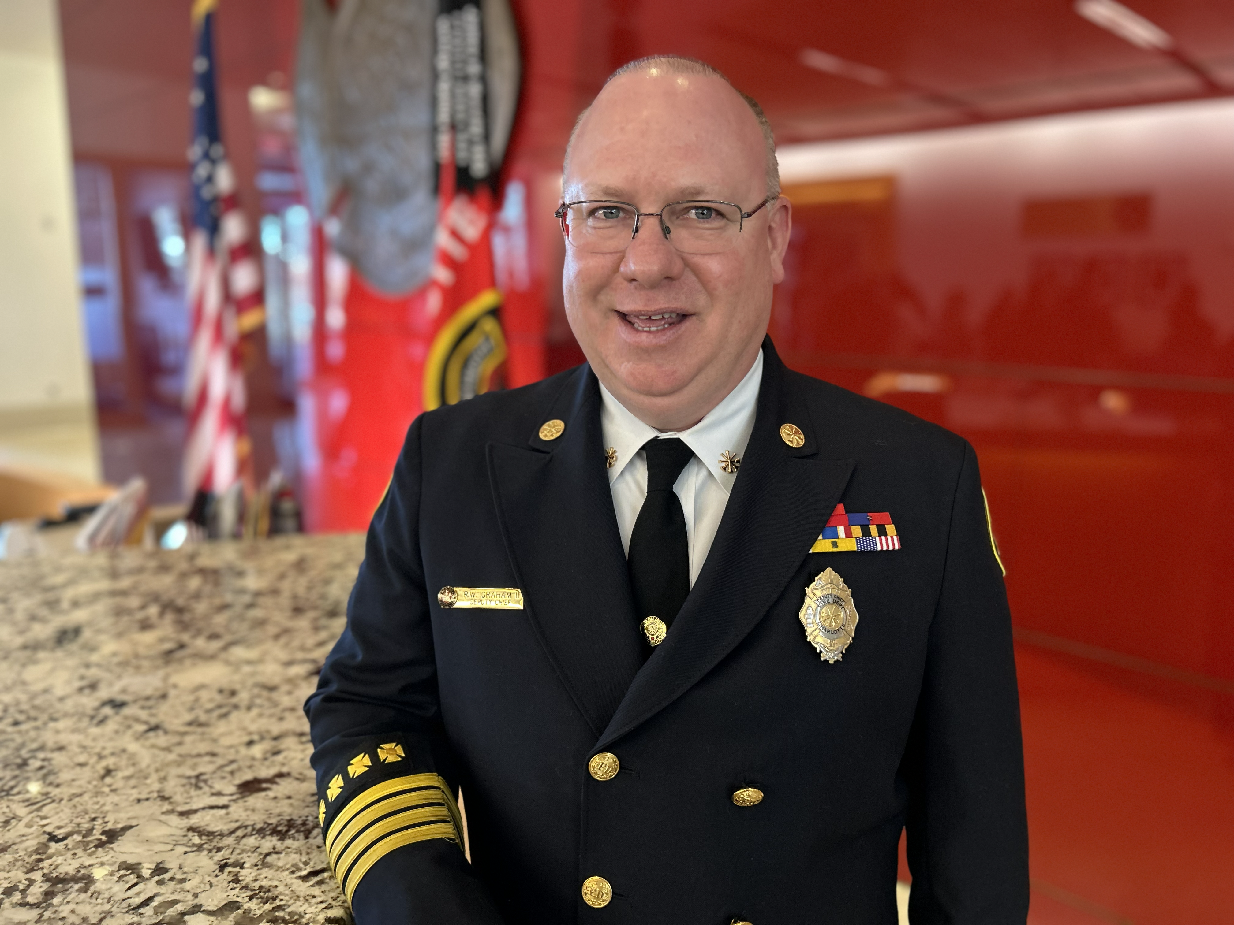 Deputy Chief Wike Graham is pictured at Charlotte Fire headquarters following his promotion. 