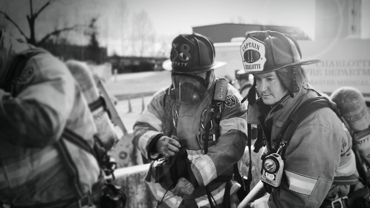 Captain David Hodnett coordinates with his team during a winter training scenario, emphasizing communication and tactical efficiency. 